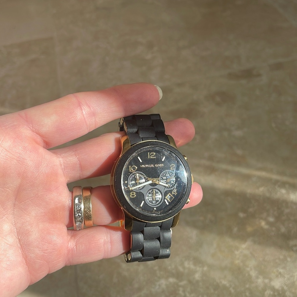 Gentle worn Michael Kors watch.